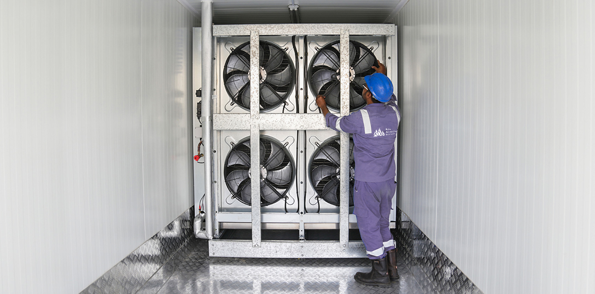 Interior of Polarspec manufacturing unit, showcasing equipment and personnel