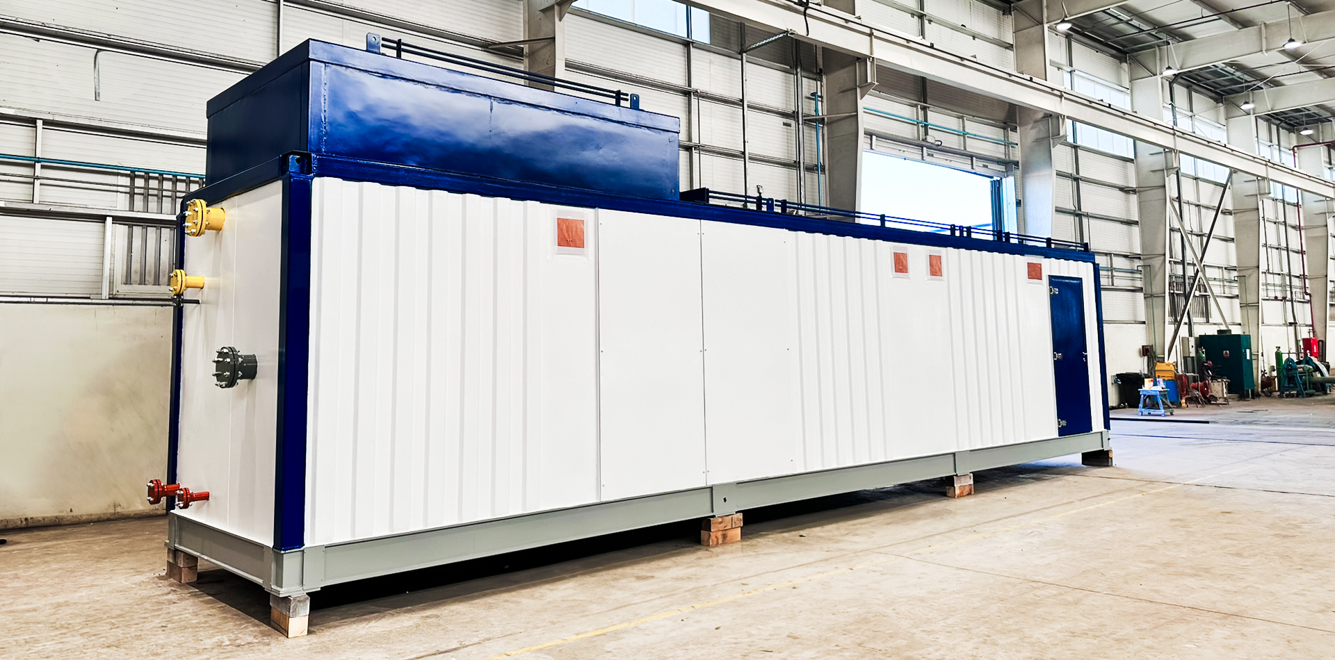 Interior of Polarspec manufacturing unit, showcasing equipment and personnel