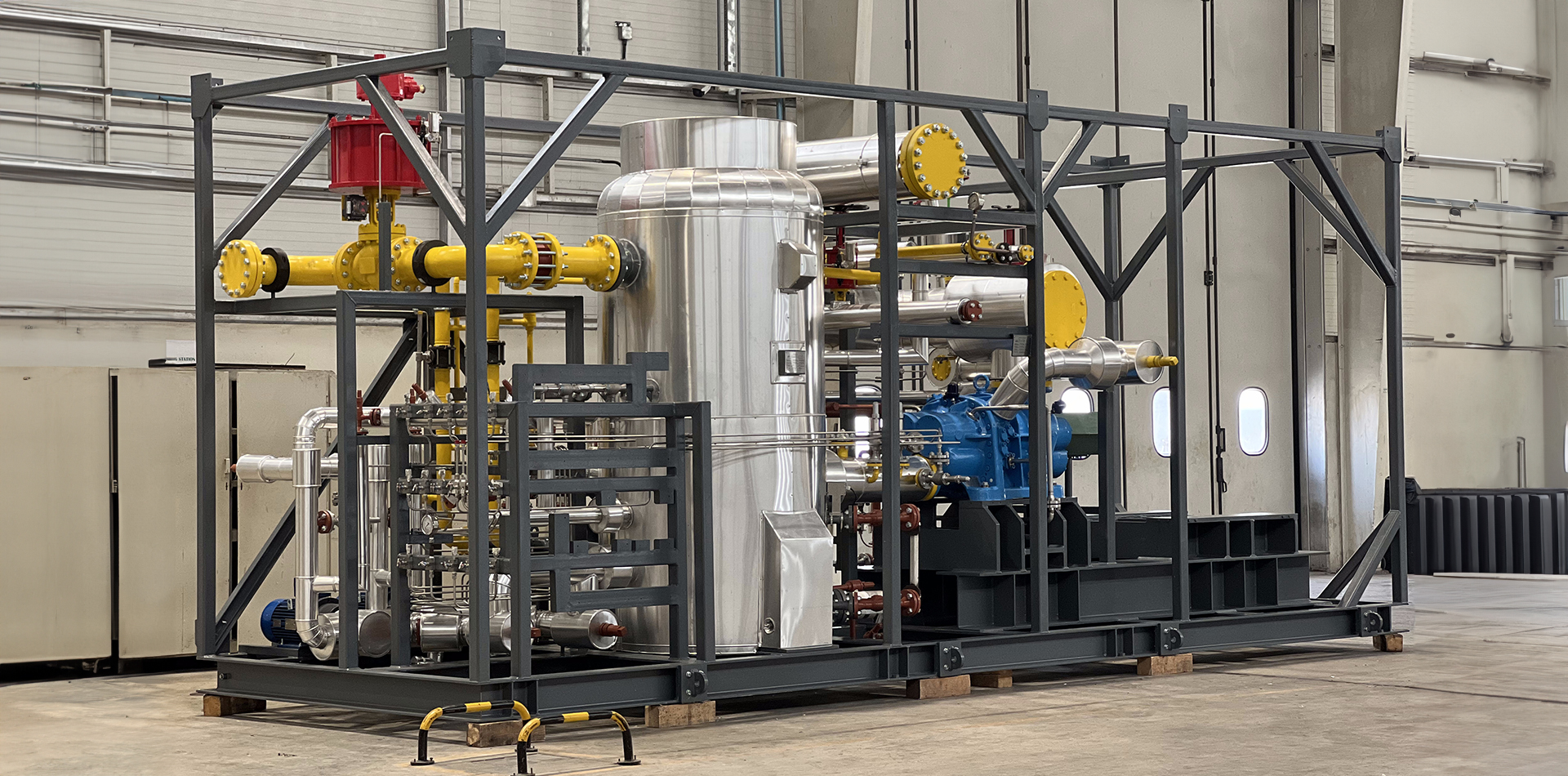 Interior of Polarspec manufacturing unit, showcasing equipment and personnel
