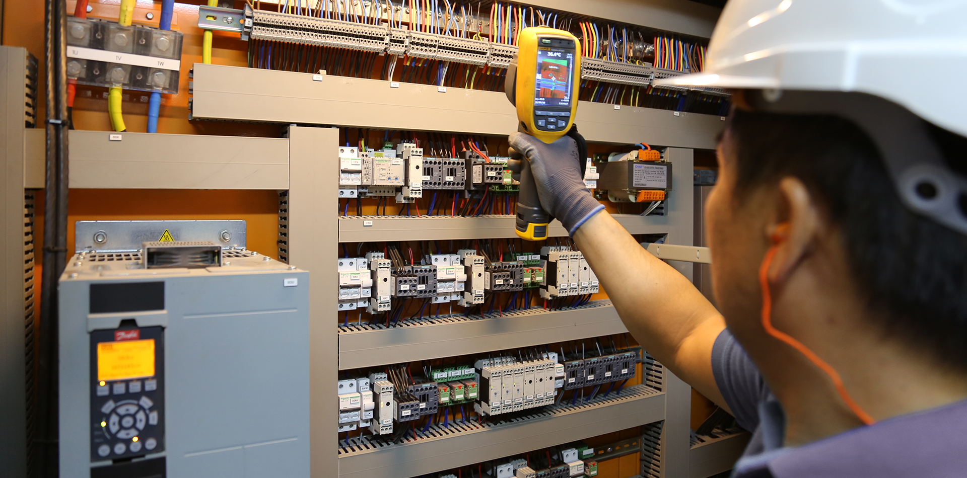 Interior of Polarspec manufacturing unit, showcasing equipment and personnel